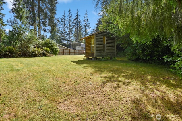 8031 Fir Tree Ln, Lake Stevens, WA 98258 - view of yard featuring a detached carport and a storage unit