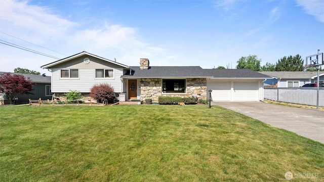 1314 S Division St, Walla Walla, WA 99362 - tri-level home with a chimney, concrete driveway, a garage, and stone siding