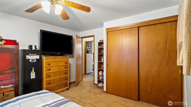 1314 S Division St, Walla Walla, WA 99362 - bedroom with light carpet, a closet, and a ceiling fan
