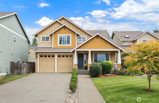 12115 184th Ave E, Bonney Lake, WA 98391 - craftsman-style house featuring board and batten siding, driveway, a garage, covered porch, and roof with shingles