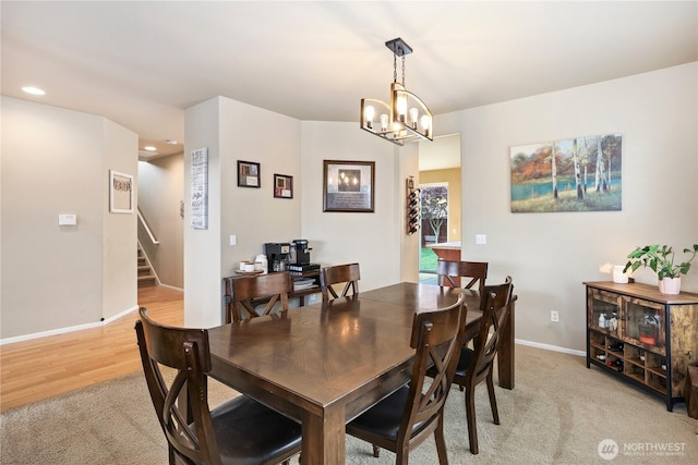 12115 184th Ave E, Bonney Lake, WA 98391 - dining area featuring a chandelier, stairs, recessed lighting, and light colored carpet