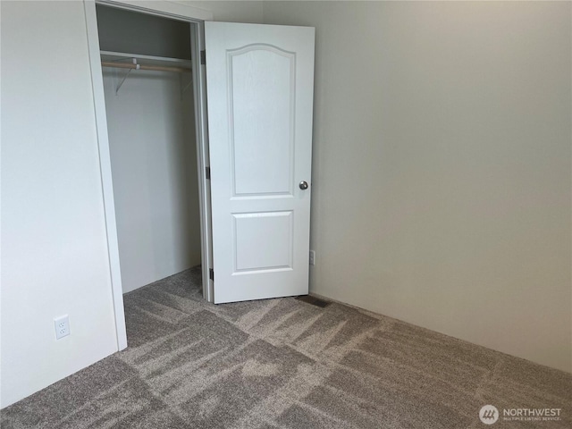 375 Union Ave SE Unit 97, Renton, WA 98059 - unfurnished bedroom featuring carpet flooring and a closet