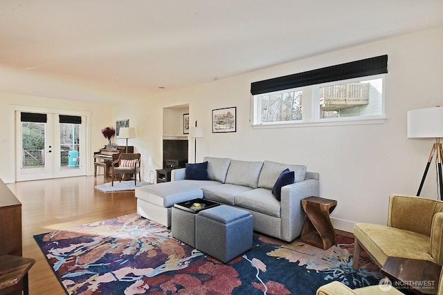 4876 Breezefair Rd, Freeland, WA 98249 - living room with french doors and wood finished floors