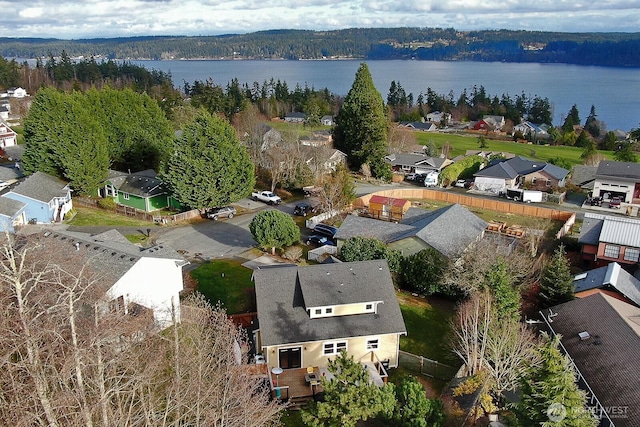 4876 Breezefair Rd, Freeland, WA 98249 - aerial perspective of suburban area featuring a large body of water and a heavily wooded area