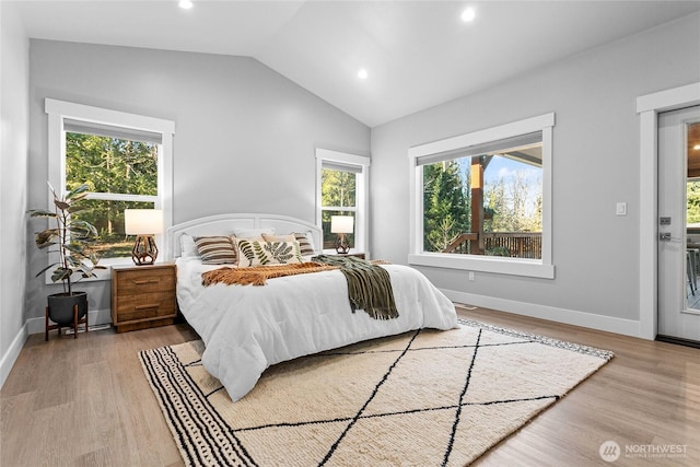 989 Lakewood Ln, Bellingham, WA 98229 - bedroom featuring multiple windows, vaulted ceiling, wood finished floors, and recessed lighting