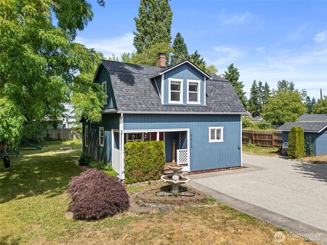 9413 356th Street Ct S, Roy, WA 98558 - view of front of home featuring a chimney and roof with shingles