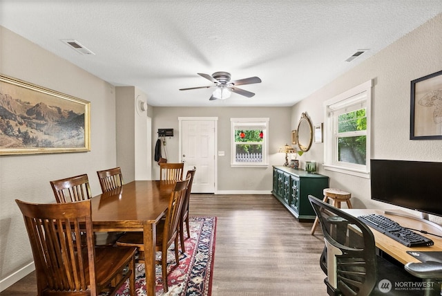 9413 356th Street Ct S, Roy, WA 98558 - dining room with dark wood finished floors, a ceiling fan, a textured ceiling, and an office area