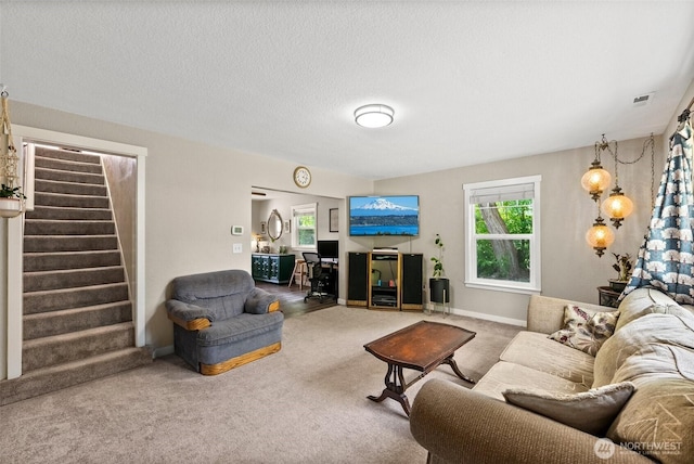 9413 356th Street Ct S, Roy, WA 98558 - carpeted living area with stairway and plenty of natural light