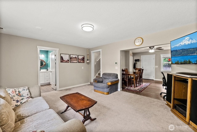 9413 356th Street Ct S, Roy, WA 98558 - living room featuring stairway and baseboards
