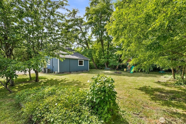 9413 356th Street Ct S, Roy, WA 98558 - view of green lawn featuring an outbuilding