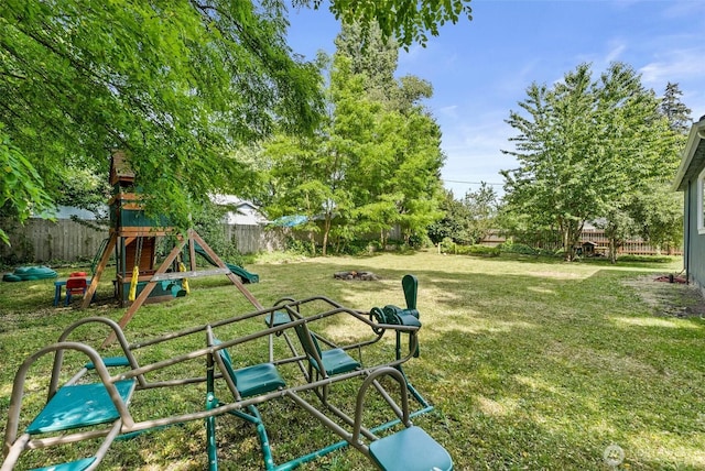 9413 356th Street Ct S, Roy, WA 98558 - fenced backyard featuring a playground