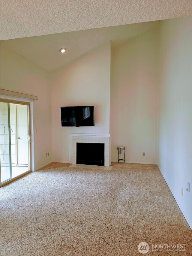 12840 SE 40th Ct Unit B12, Bellevue, WA 98006 - unfurnished living room featuring carpet floors, a fireplace with flush hearth, and recessed lighting