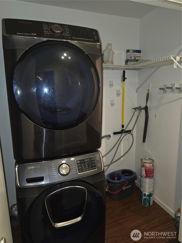 12840 SE 40th Ct Unit B12, Bellevue, WA 98006 - laundry area with estacked washer and dryer and wood finished floors