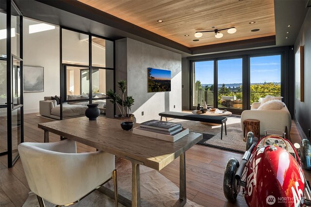 9001 NE 14th St, Clyde Hill, WA 98004 - dining space featuring wood ceiling, wood finished floors, and a tray ceiling
