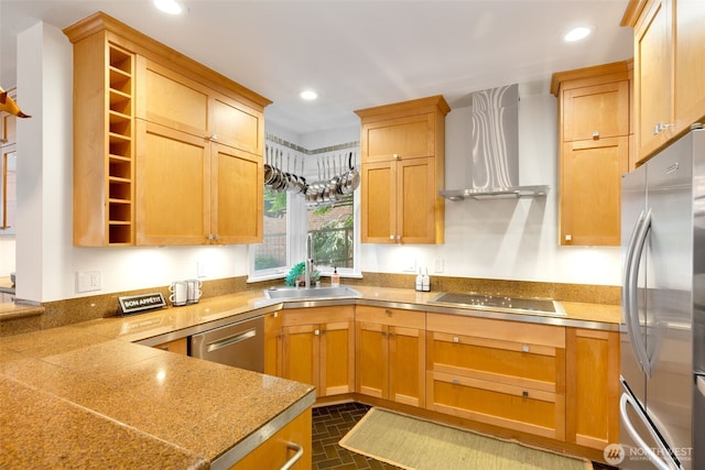 719 2nd Ave W Unit 101, Seattle, WA 98119 - kitchen with appliances with stainless steel finishes, wall chimney range hood, brick patterned flooring, recessed lighting, and light countertops