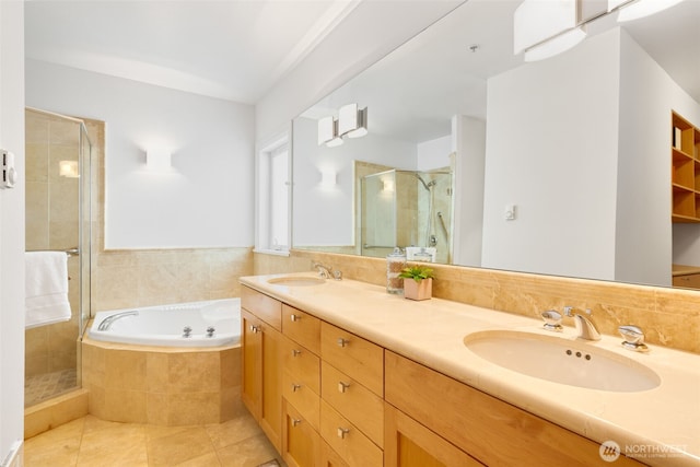 719 2nd Ave W Unit 101, Seattle, WA 98119 - full bathroom featuring a stall shower, double vanity, tile patterned flooring, and a garden tub