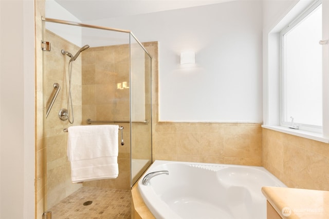 719 2nd Ave W Unit 101, Seattle, WA 98119 - full bath featuring a garden tub and a shower stall