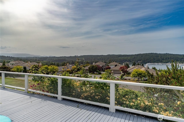 95 Martingale Pl, Port Ludlow, WA 98365 - wooden terrace with a wooded view and a residential view