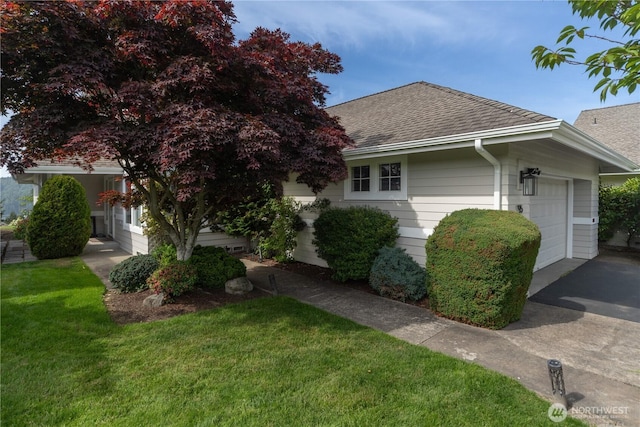 95 Martingale Pl, Port Ludlow, WA 98365 - view of front of house featuring a shingled roof, a garage, a front lawn, and driveway