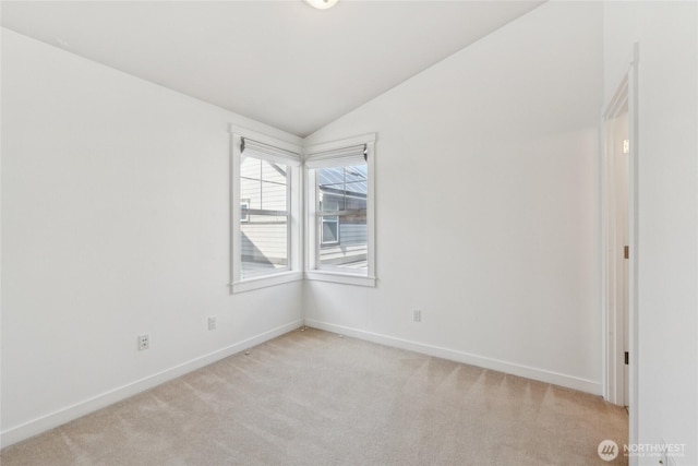 9503 Ashworth Ave N Unit B, Seattle, WA 98103 - unfurnished room with lofted ceiling and light colored carpet