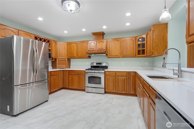 3941 16th Ln NE, Olympia, WA 98506 - kitchen with appliances with stainless steel finishes, light countertops, glass insert cabinets, recessed lighting, and under cabinet range hood