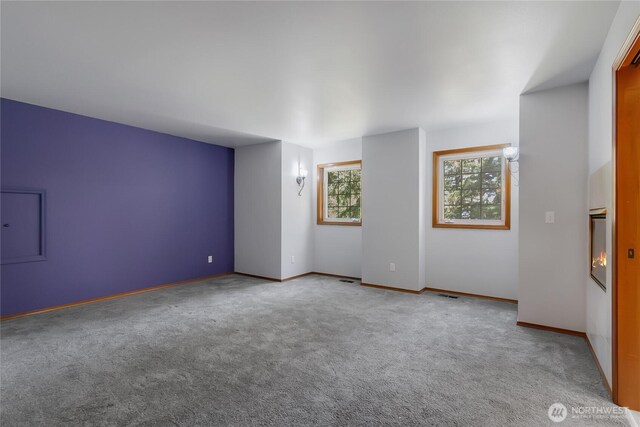 3941 16th Ln NE, Olympia, WA 98506 - carpeted spare room featuring baseboards