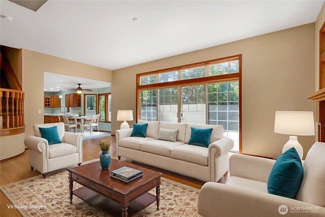 3941 16th Ln NE, Olympia, WA 98506 - living area featuring light wood finished floors and a ceiling fan