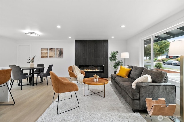 6347 121st Ave SE, Bellevue, WA 98006 - living area with recessed lighting, light wood-style floors, and a large fireplace
