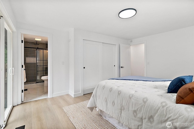 6347 121st Ave SE, Bellevue, WA 98006 - bedroom featuring a closet, light wood finished floors, and ensuite bath