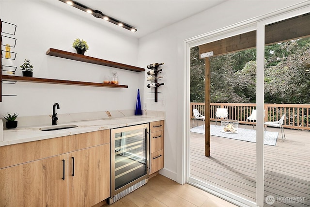 6347 121st Ave SE, Bellevue, WA 98006 - indoor wet bar featuring wine cooler and light wood-style flooring