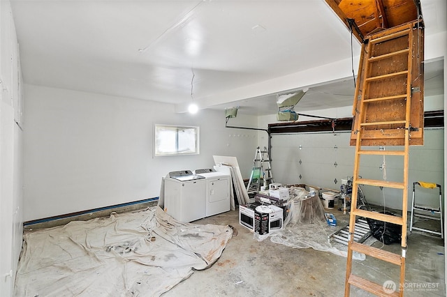 6347 121st Ave SE, Bellevue, WA 98006 - basement featuring washer and clothes dryer and a garage