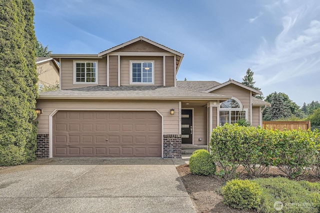 15223 SE 276th Pl, Kent, WA 98042 - view of front of property featuring a garage, driveway, a shingled roof, and brick siding