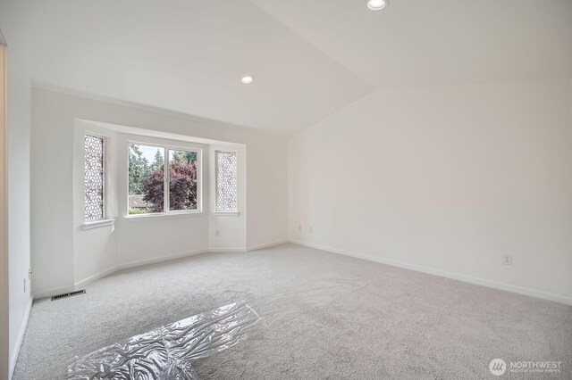 15223 SE 276th Pl, Kent, WA 98042 - spare room with carpet, vaulted ceiling, and recessed lighting