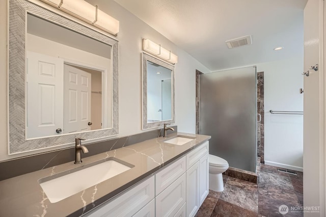 15223 SE 276th Pl, Kent, WA 98042 - bathroom featuring double vanity, a shower stall, and stone finish flooring