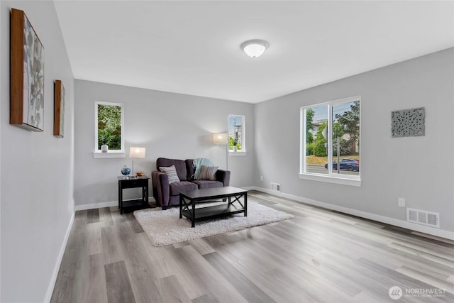 1815 S Cedar St, Tacoma, WA 98405 - sitting room with wood finished floors and healthy amount of natural light
