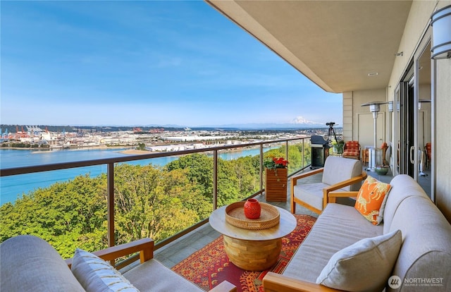 207 Broadway Unit 500, Tacoma, WA 98402 - balcony with a water view and an outdoor living space