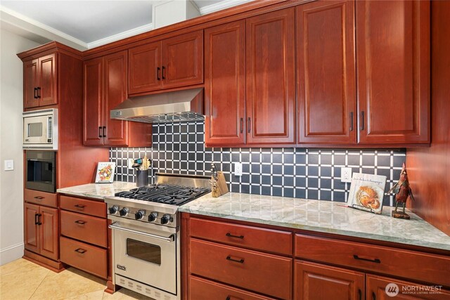 207 Broadway Unit 500, Tacoma, WA 98402 - kitchen with stainless steel appliances, exhaust hood, light stone countertops, backsplash, and crown molding