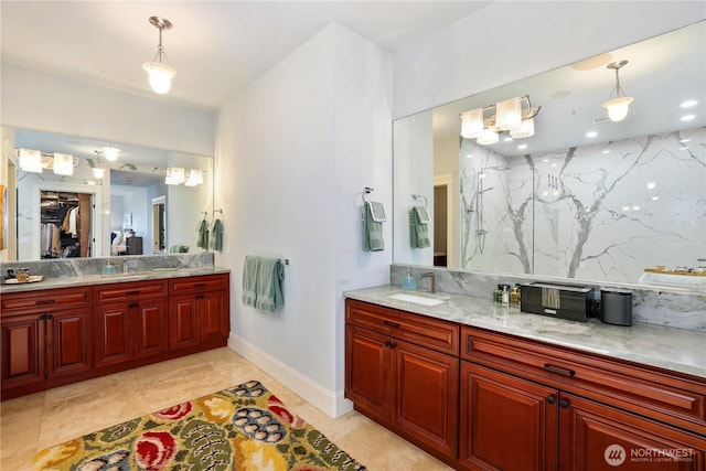 207 Broadway Unit 500, Tacoma, WA 98402 - full bathroom featuring vanity, a marble finish shower, and a spacious closet