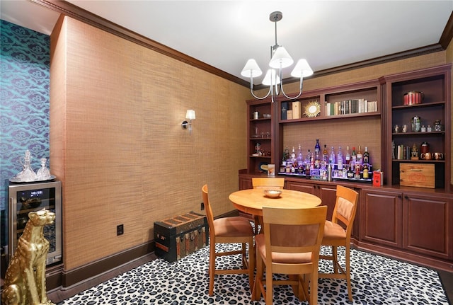 207 Broadway Unit 500, Tacoma, WA 98402 - dining area featuring crown molding, a chandelier, wine cooler, a dry bar, and wallpapered walls