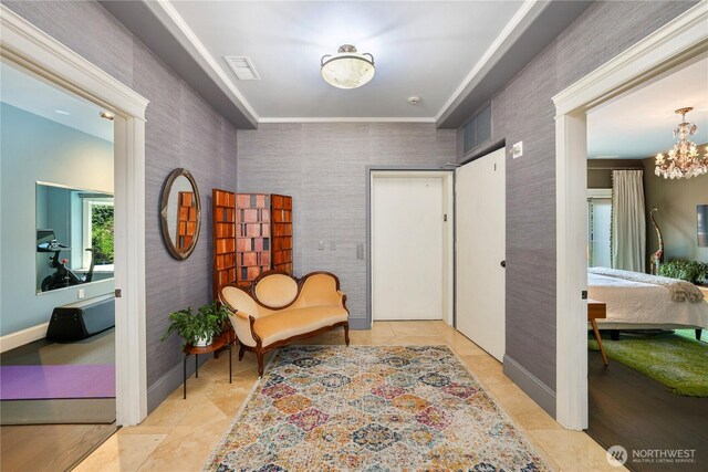 207 Broadway Unit 500, Tacoma, WA 98402 - living area with light tile patterned floors and a chandelier
