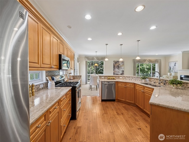 31867 48th Cir SW Unit 14A, Federal Way, WA 98023 - kitchen with stainless steel appliances, ornamental molding, light stone countertops, light wood-style floors, and recessed lighting