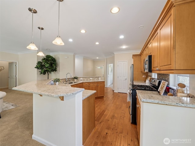 31867 48th Cir SW Unit 14A, Federal Way, WA 98023 - kitchen featuring stainless steel appliances, crown molding, recessed lighting, a breakfast bar area, and light stone counters