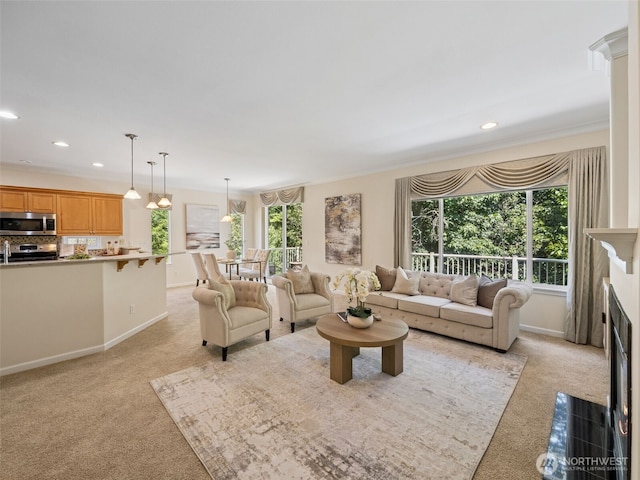 31867 48th Cir SW Unit 14A, Federal Way, WA 98023 - living room featuring light carpet, healthy amount of natural light, recessed lighting, and a fireplace with flush hearth