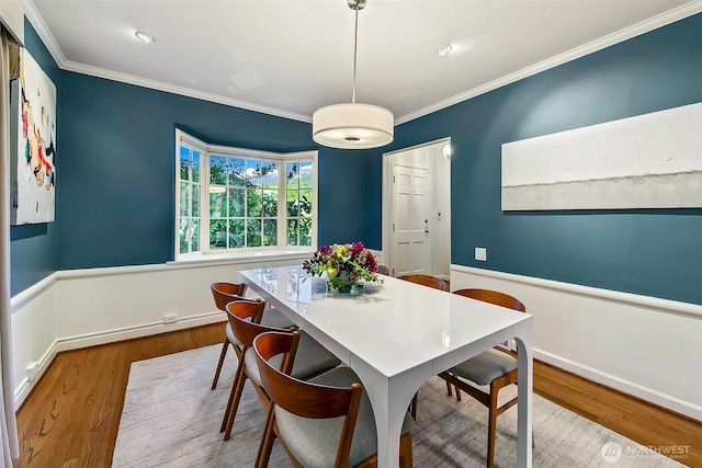 4412 43rd Ave NE, Seattle, WA 98105 - dining space with ornamental molding and wood finished floors