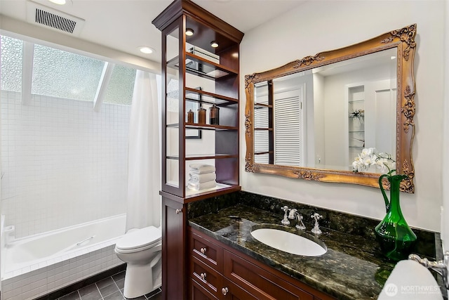 4412 43rd Ave NE, Seattle, WA 98105 - bathroom featuring shower / tub combo, vanity, and tile patterned flooring