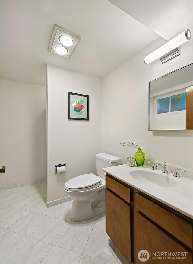 4412 43rd Ave NE, Seattle, WA 98105 - bathroom featuring marble finish floors and vanity