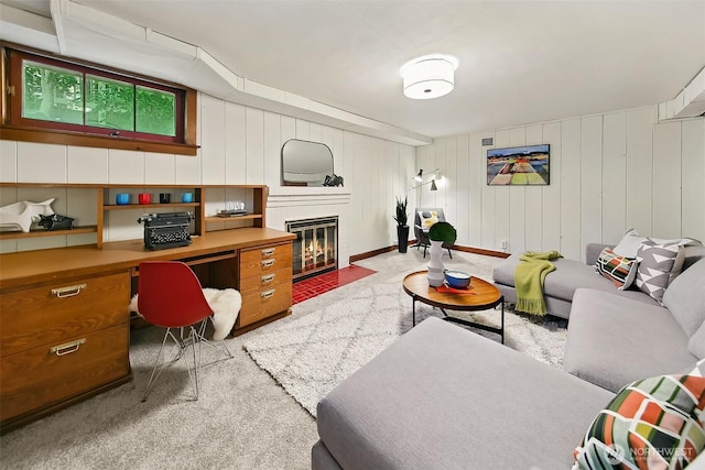 4412 43rd Ave NE, Seattle, WA 98105 - carpeted living room with a fireplace with flush hearth and built in study area