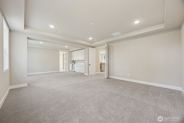 10630 134th Dr NE Unit 112, Lake Stevens, WA 98258 - spare room featuring recessed lighting, light carpet, and a raised ceiling