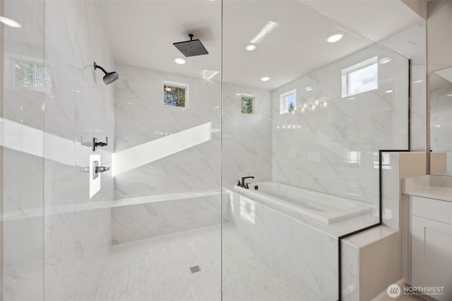 10630 134th Dr NE Unit 112, Lake Stevens, WA 98258 - bathroom with a bath, a marble finish shower, vanity, and recessed lighting