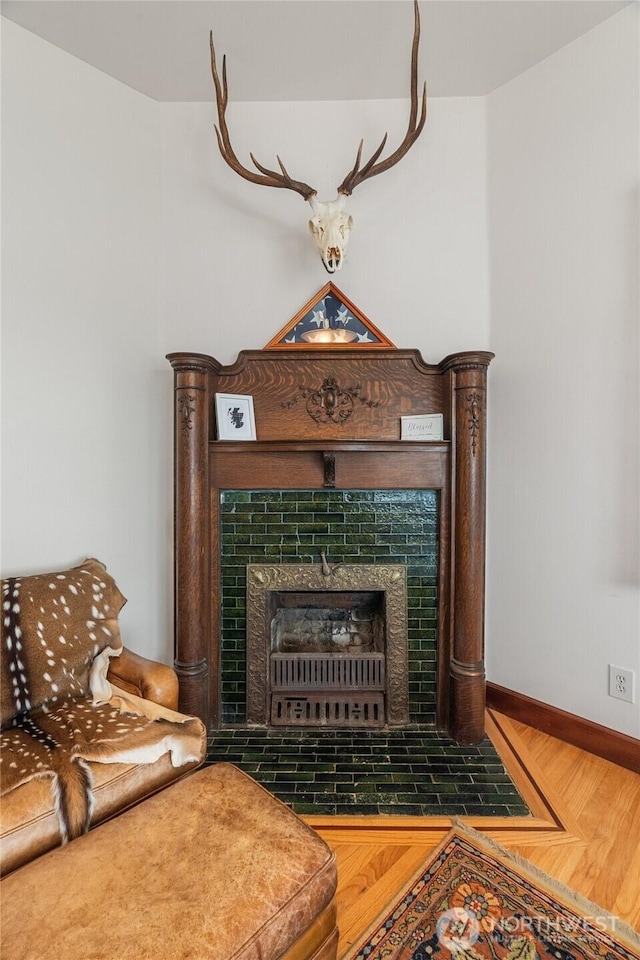 404 W Marcy Ave, Montesano, WA 98563 - detailed view of a tiled fireplace and wood finished floors